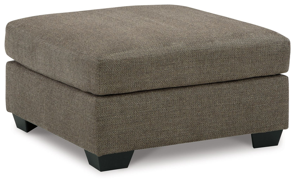 Mahoney oversized accent ottoman in chocolate by Ashley Furniture