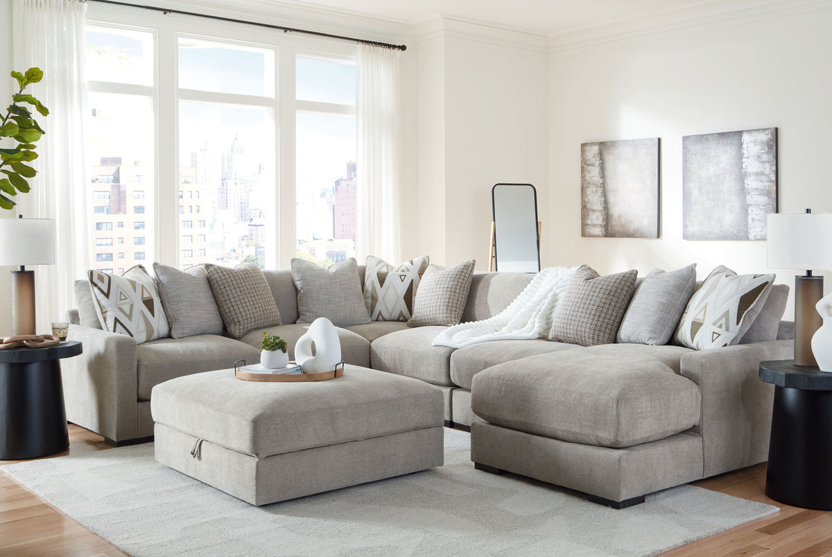 Aslan Court 6-piece sectional with RAF corner chaise and ottoman in pebble by Ashley Furniture